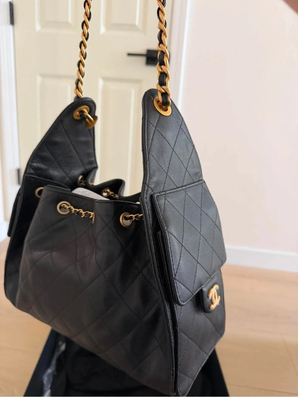 CHANEL Black Quilted Leather Shoulder Bag with Gold Chain & CC Logo